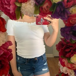 Fashion Nova off the shoulder white shirt.